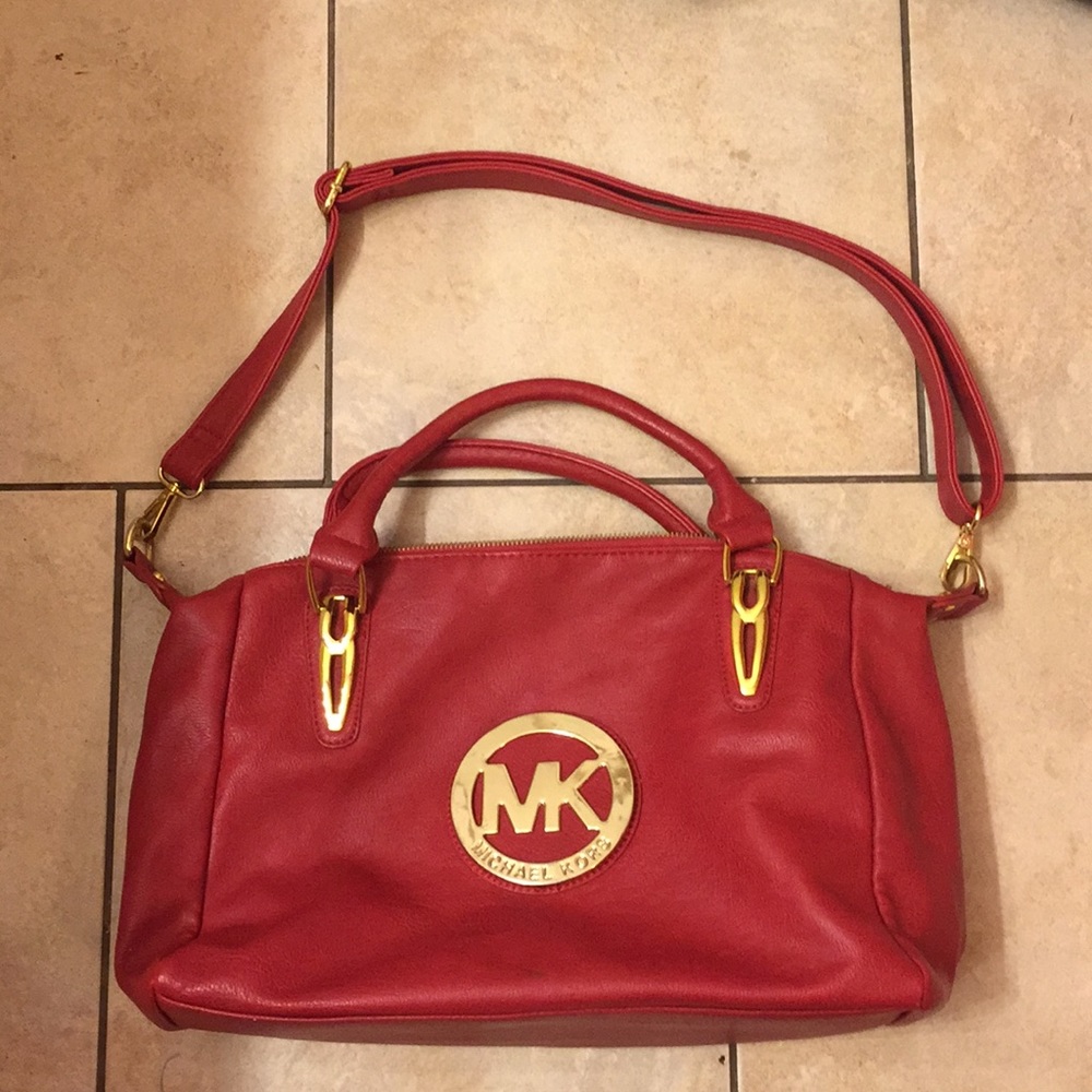 Large red Michael Kors bag